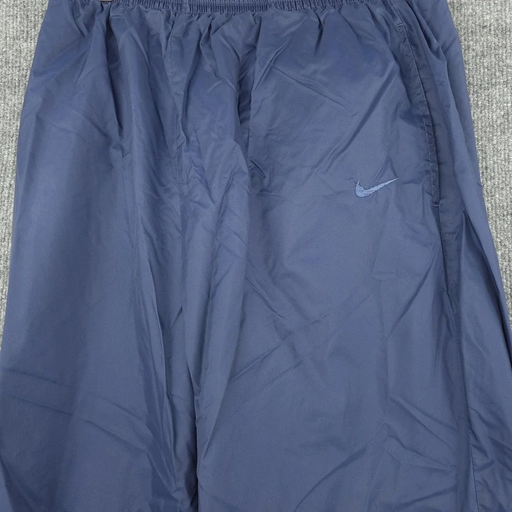 VINTAGE Nike Track Pants Mens‎ Large Blue Lined Elastic Cuff Zip Leg Athletic